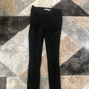 Levi’s 711 Distressed Black Skinny Jeans